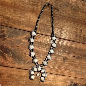 White Buffalo and Navajo Pearl squash blossom